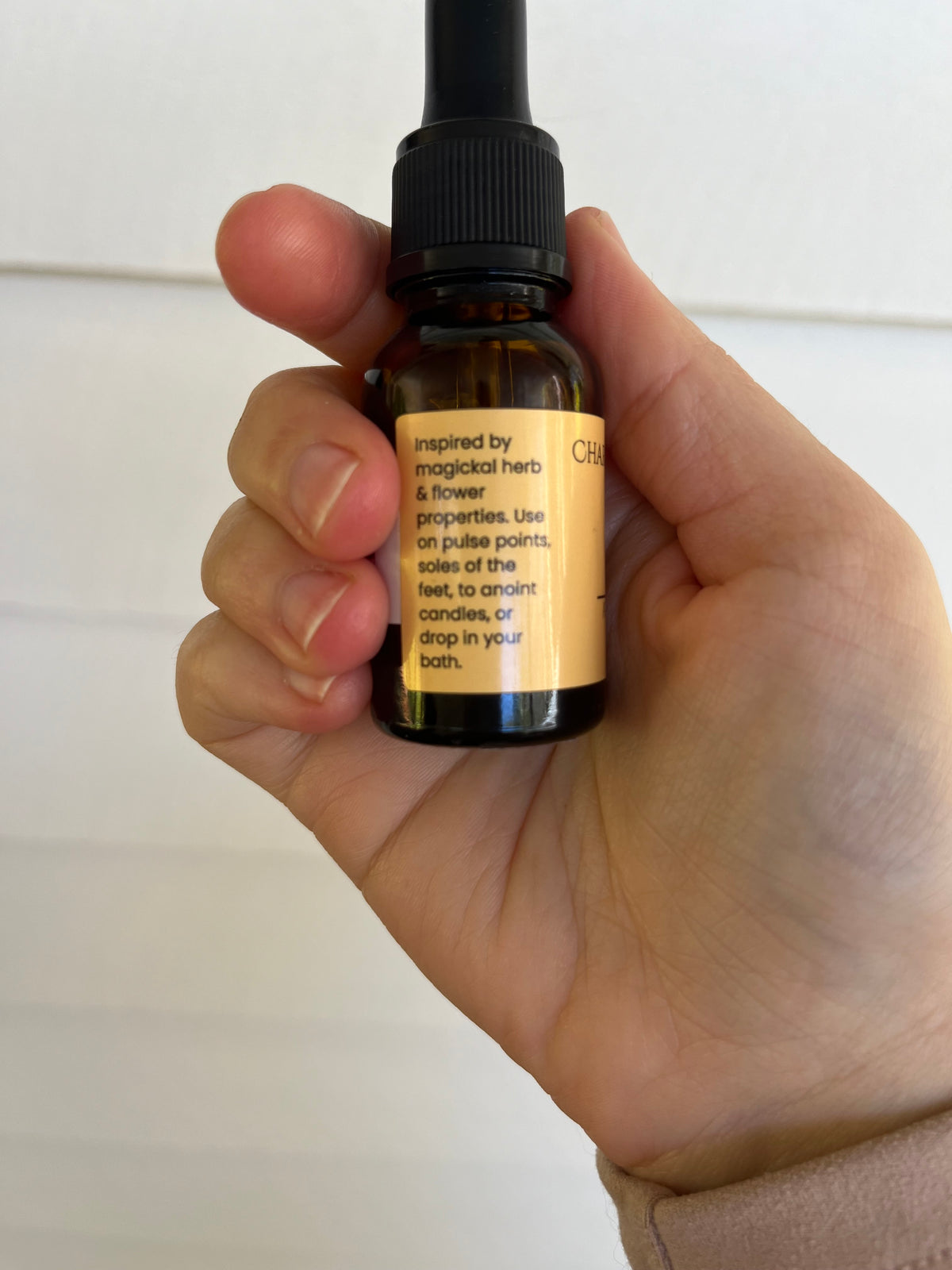 Joy Spell Oil used during a personal ritual for happiness, positivity and confidence