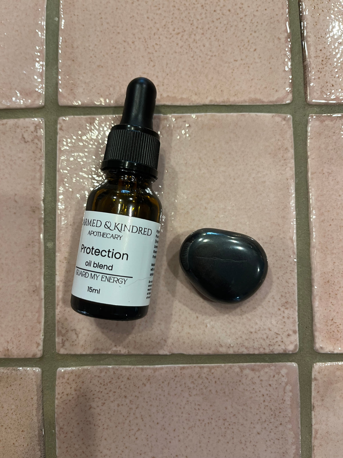 Protection Spell Oil used as part of a personal grounding and protection ritual