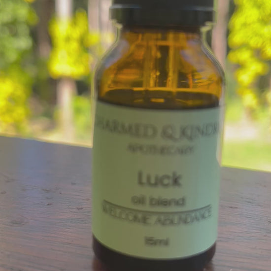 Luck Spell Oil featuring bergamot, orange, basil and frankincense oils