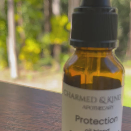 Protection Spell Oil featuring lavender, rosemary and frankincense oils